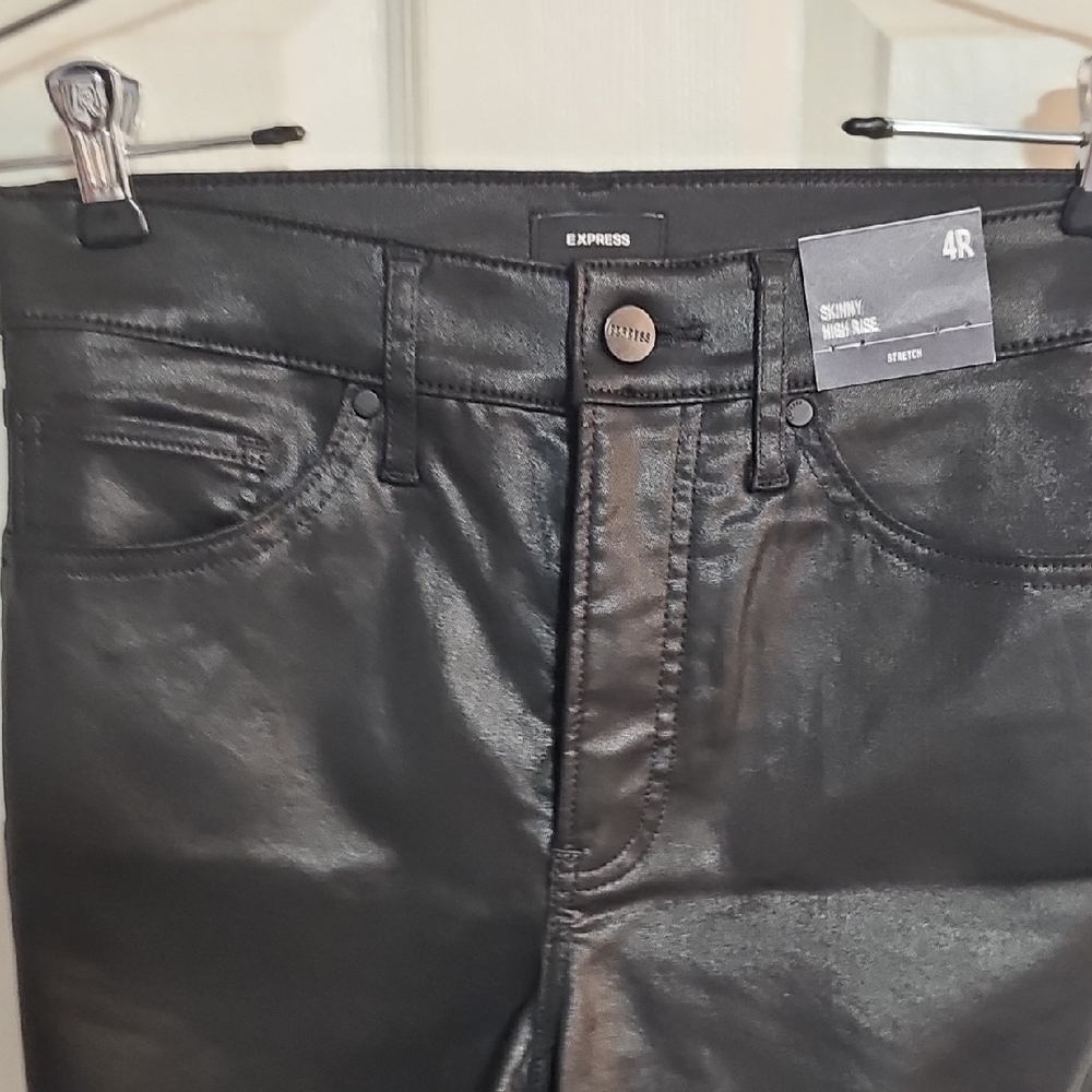 Express beand new size 4 coated Black Skinny Jeans